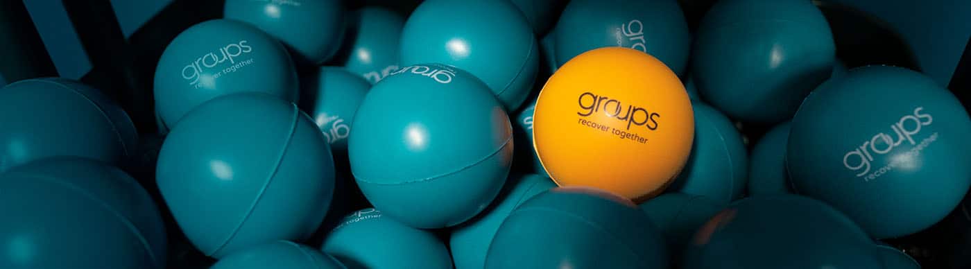 A pile of Groups Recover Together stress balls